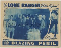 3p1237 LONE RANGER RIDES AGAIN chapter 12 LC 1939 Robert Livingston & others in barn, Blazing Peril!