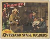 3p1268 OVERLAND STAGE RAIDERS LC 1938 John Wayne in The Three Mesquiteers with radio & bound man!