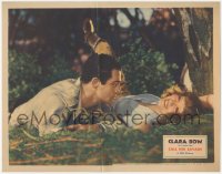 3y0587 CALL HER SAVAGE LC 1932 great close up of carefree Clara Bow laying on ground in the woods!