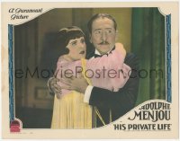 3y0619 HIS PRIVATE LIFE LC 1928 close up of Adolphe Menjou holding Margaret Livingston close!