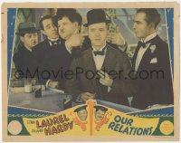 3y0647 OUR RELATIONS LC 1936 Oliver Hardy plugs Stan Laurel's ears so he doesn't hear bad news, rare!