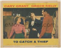 3y0669 TO CATCH A THIEF LC #4 1955 Cary Grant, Brigitte Auber & guy in wine cellar, Alfred Hitchcock