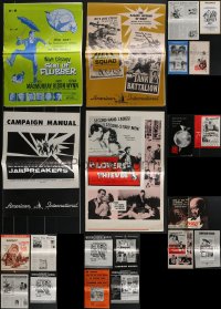 4a0398 LOT OF 25 UNCUT PRESSBOOKS 1960s-1970s advertising for a variety of different movies!