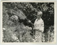 4f1265 BORIS KARLOFF 6.5x8.5 news photo 1939 at home watering posies, flowers are his real weakness!