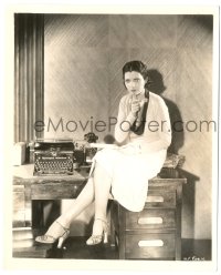 4f1418 KAY FRANCIS 8.25x10 still 1930s full-length c/u sitting on desk with pen held to her mouth!