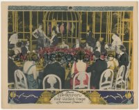 4f0514 HER GILDED CAGE LC 1922 lots of people at table watch Gloria Swanson by giant bird cage!