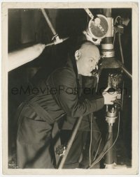 4j1557 MAD LOVE candid 8x10.25 still 1935 Peter Lorre in full makeup talking on phone between scenes!