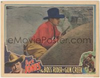 4p0458 BOSS RIDER OF GUN CREEK LC 1936 close up of Buck Jones with gun drawn hiding behind boulder!