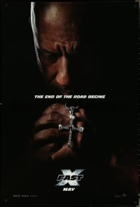 4r0759 FAST X teaser DS 1sh 2023 image of Vin Diesel praying with diamond-studded cross in hands!