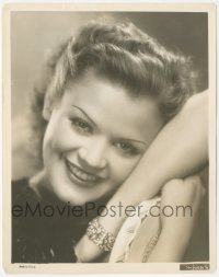 4y1273 SIMONE SIMON 8x10.25 still 1930s great close smiling portrait with her head on her arm!