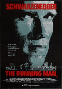 4y0344 RUNNING MAN Aust 1sh 1987 huge close up headshot of Arnold Schwarzenegger in the year 2019!