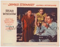 4y0578 REAR WINDOW LC #7 1954 Hitchcock, Thelma Ritter & Grace Kelly look at excited James Stewart!