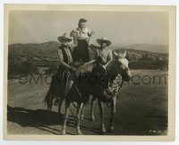 5b1878 RANGE FEUD 8x10 still 1931 wonderful image of John Wayne & Buck Jones holding Susan Fleming!