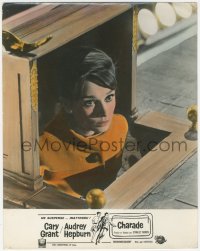 5b0485 CHARADE French LC 1963 close up of Audrey Hepburn watching stage from inside box, Donen!