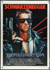 5b0323 TERMINATOR Italian 1p 1985 close up of classic cyborg Arnold Schwarzenegger with gun!