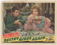 5b0801 DESTRY RIDES AGAIN LC 1939 c/u of new sheriff James Stewart staring at sexy Marlene Dietrich!