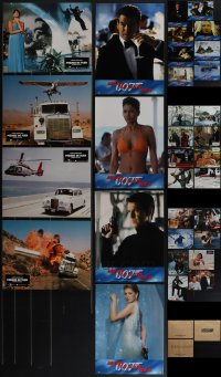 5d0419 LOT OF 32 1985-2002 JAMES BOND FRENCH LOBBY CARDS 1985-2002 three complete sets w/envelopes!