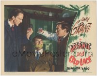 5f0234 ARSENIC & OLD LACE LC 1944 Peter Lorre & Raymond Massey toast over bound & gagged Cary Grant!