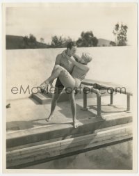 5j1784 JOAN BLONDELL/ROBERT ALLEN 8x10 still 1931 he uses caveman method to get her swimsuit wet!