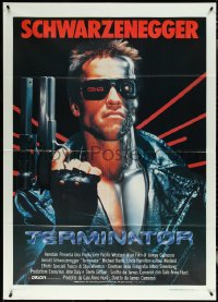 5r0101 TERMINATOR Italian 1p 1985 close up of classic cyborg Arnold Schwarzenegger with gun!