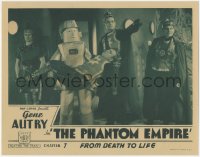 5r1383 PHANTOM EMPIRE chapter 7 LC 1935 unconscious Gene Autry carried by funky Muranian robot!