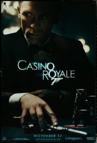 5s0843 CASINO ROYALE teaser 1sh 2006 Craig as James Bond sitting at poker table w/gun!