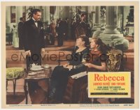 5t0681 REBECCA LC #2 R1956 Alfred Hitchcock, Laurence Olivier talks to Joan Fontaine having tea!