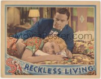 5t0682 RECKLESS LIVING LC 1931 close up of Mae Clarke & Norman Foster laying on bed, ultra rare!