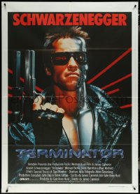 5y0417 TERMINATOR Italian 1p 1985 close up of classic cyborg Arnold Schwarzenegger with gun!