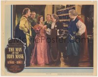 5y0825 MAN IN THE IRON MASK LC 1939 directed by James Whale, Joan Bennett surrounded by Musketeers!