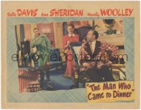 5y0827 MAN WHO CAME TO DINNER LC 1942 Gardiner waves at Bette Davis pushing Woolley in wheelchair!