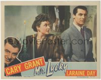 5y0845 MR. LUCKY LC 1943 Laraine Day in fur coat staring at perplexed Cary Grant, gambling classic!