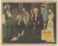 6b0419 A-HAUNTING WE WILL GO LC 1942 Oliver Hardy in wacky costume with crowd around dead guy!