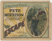 6b0357 ESCAPE TC 1926 c/u of cowboy Pete Morrison rescuing man falling from cliffs, very rare!