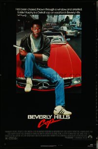 6c0676 BEVERLY HILLS COP 1sh 1984 great image of detective Eddie Murphy sitting on red Mercedes!
