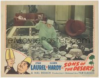 6p0715 SONS OF THE DESERT LC R1945 Oliver Hardy after his wife has thrown the entire kitchen at him!