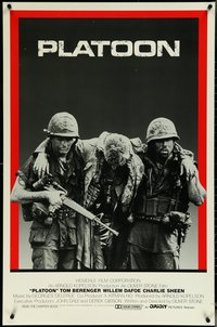 6r0859 PLATOON int'l 1sh 1986 Charlie Sheen & Quinn helping with soldier, Oliver Stone, Vietnam War!