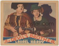 6t0698 DEVIL'S BROTHER LC 1933 close up of Stan Laurel & Oliver Hardy with blunderbuss guns, rare!