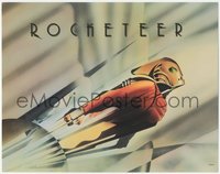 6t0631 ROCKETEER TC 1991 Disney, cool John Mattos art of Bill Campbell in full costume!