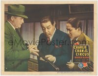 6y0724 CHARLIE CHAN AT THE CIRCUS LC 1936 Keye Luke & Warner Oland inspect rifle, ultra rare!