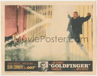 6y0785 GOLDFINGER LC #3 1964 Sean Connery as James Bond watches Oddjob get electrocuted on fence!