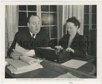 7b1435 ALFRED HITCHCOCK candid 8.25x10 still 1943 at home dictating script changes to his wife Alma!