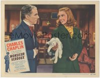 7b0942 MONSIEUR VERDOUX LC #6 1947 close up of Charlie Chaplin & pretty Marilyn Nash holding kitten!