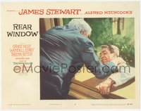 7b0983 REAR WINDOW LC #3 1954 Alfred Hitchcock, Raymond Burr pushes Jimmy Stewart out of window!