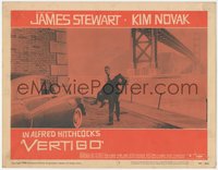 7b1054 VERTIGO LC #7 1958 Alfred Hitchcock, James Stewart carrying blonde Kim Novak by bridge!