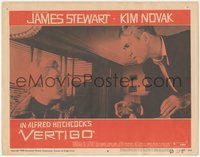 7b1055 VERTIGO LC #8 1958 Alfred Hitchcock, standing James Stewart glares at blonde Kim Novak!