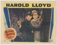 7b1061 WELCOME DANGER LC 1929 c/u of scared Harold Lloyd holding rope as Noah Young grabs him, rare!