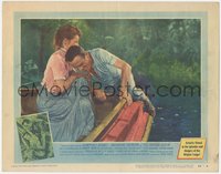 7f0527 AFRICAN QUEEN LC #8 1952 missionary Katharine Hepburn helps Humphrey Bogart into the boat!