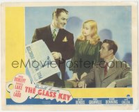 7f0562 GLASS KEY LC 1942 Veronica Lake between Alan Ladd & Brian Donlevy with newspaper!