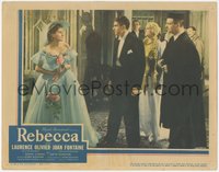 7f0587 REBECCA LC 1940 Laurence Olivier & others stare at Joan Fontaine, Alfred Hitchcock classic!